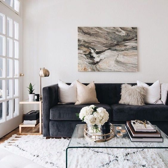 Mid-century Design Mixing With A Black Sofa